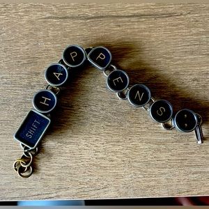 Quirky “SHIFT happens ;” typewriter key bracelet